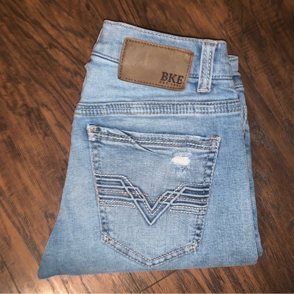 BKE Blue Bootcut Jeans with Distressing and Contrast Stitching